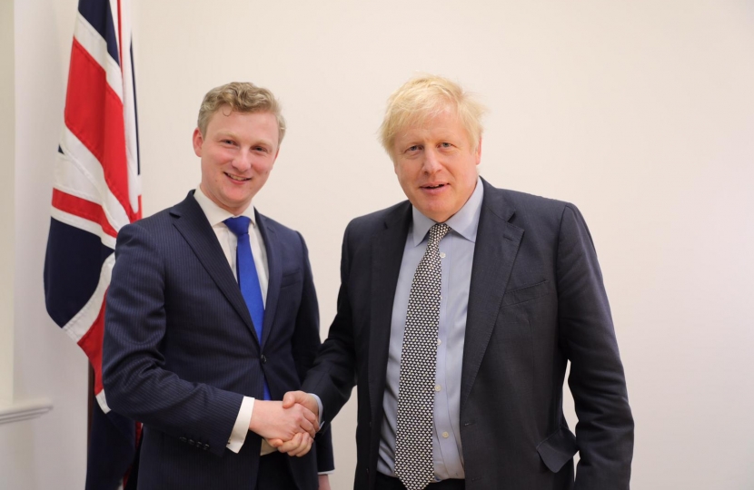Sam with Boris Johnson during the 2019 General Election