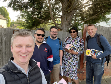 Sam out campaigning with his team